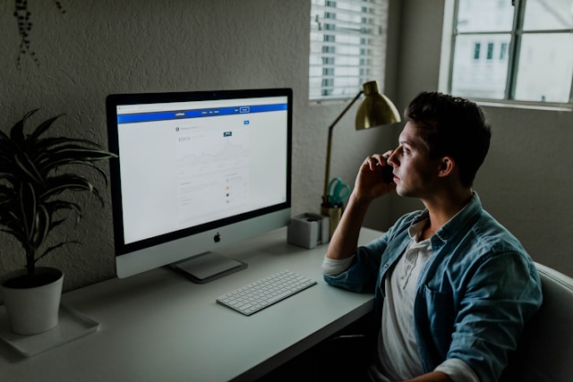 Man looking at computer monitor